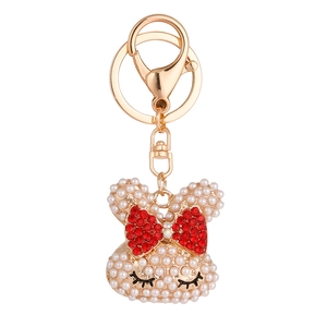 Cute bunny pearl keychain with red rhinestone bow on a gold plated lobster clasp