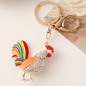 Colorful rhinestone rooster keychain with multi-color enamel feathers and gold metal finish