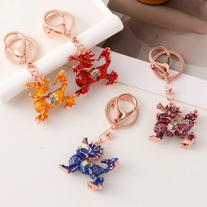 Traditional Chinese Kirin keychain set in four vibrant colors with rose gold hardware