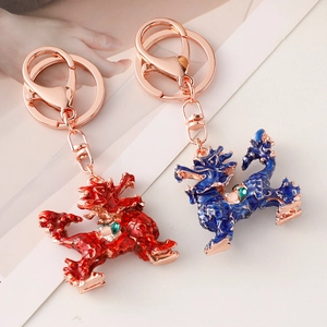 Traditional Chinese style Kirin keychain set in red and blue enamel with rose gold hooks