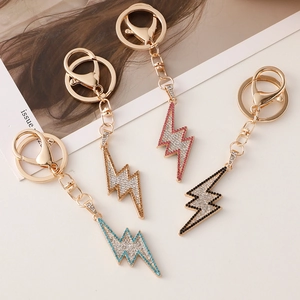 Diamond-encrusted lightning bolt keychains in four colors for bags and cars