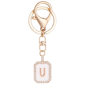 Portachiavi lettera U in oro rosa con smalto bianco e ciondolo con strass brillanti