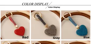 Detailed grid view showing colorful sparkling heart keychains in red, grey and blue crystals