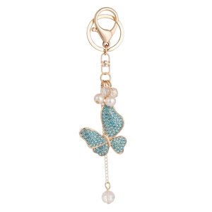 Blue crystal butterfly keychain with pearls and tassels on a gold alloy lobster clasp