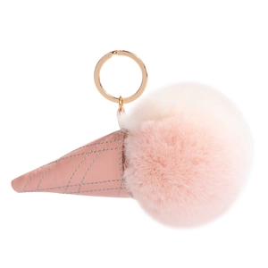 Pink faux fur ice cream cone keychain with golden ring and quilted leather base