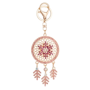 Elegant rose gold dreamcatcher keychain with pink crystals and leaf pendants on white background