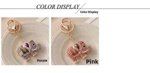 Detail view of purple and pink rhinestone elephant keychains with gold metal plating