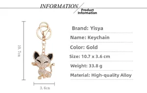 Detail view of sitting cat keychain size 10.7x3.6cm with white rhinestones and gold alloy
