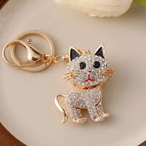 Sparkling crystal rhinestone cat keychain with golden alloy finish and D-ring clasp
