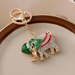 Golden Thai elephant keychain featuring sparkling rhinestones and colorful enamel patterns