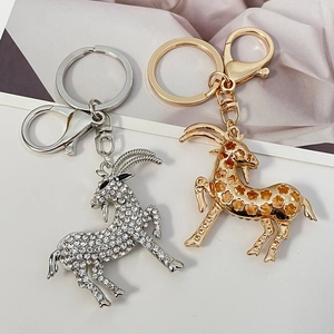 Creative goat shaped alloy keychain with sparkling rhinestones in silver and gold colors