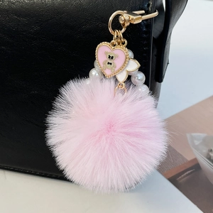 Porte-clés mignon pompon rose avec pendentif ours et chaîne de perles de luxe
