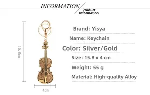 Detailed view of gold violin keychain with alloy material specifications and measurements