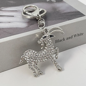 Creative silver goat keychain with sparkling white rhinestones and a lobster clasp