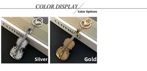 Detail view of violin keychains in silver and gold colors with sparkling rhinestones