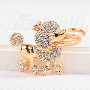 Porte-clés caniche doré exquis avec strass blancs et fermoir mousqueton en métal