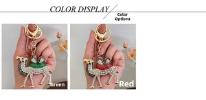 Detail showing green and red enamel camel keychains with white rhinestones and gold metal