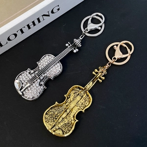 Creative violin keychain set in silver with rhinestones and antique gold finish