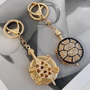 Porte-clés tortue créatif avec pierres œil de chat et strass en placage doré