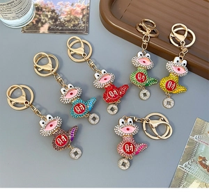 Colorful rhinestone frog keychains with fortune coin charms in six vibrant styles