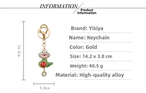 Detail view of frog keychain showing 14.2cm dimensions and sparkling green rhinestones