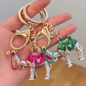 Colorful camel shaped keychain with rhinestones and enamel finish in pink and green