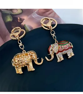 Detail of elephant keychains with heart cutouts, enamel patterns and sparkling rhinestones