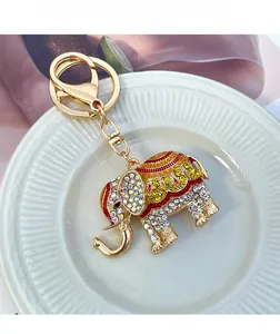 Detailed macro view of the sparkling elephant keychain with crystal rhinestones and enamel