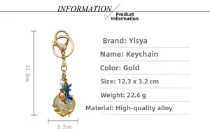 Detail view of cartoon ocean keychain with blue dolphin shell and white pearl charms