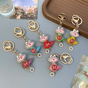 Colorful crystal snake keychains with Chinese lucky coins in six vibrant colors