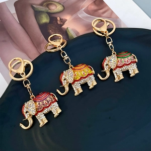 Exquisite elephant keychain with sparkling rhinestones and colorful enamel on a gold metal base