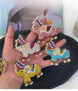 Detailed set of elephant keychains with colorful rhinestones and Thailand flag charms