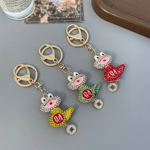 Lucky cartoon dinosaur keychain set with colorful rhinestones and golden money charm