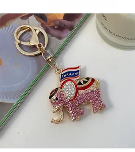 Detail of Thai crystal elephant keychain with pink rhinestones and a gold lobster clasp