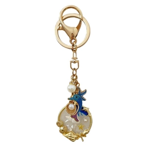 Golden ocean keychain with dolphin, pearl and shell pendants for handbags
