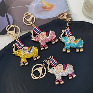 Set of four colorful Thailand elephant keychains with crystals and gold hardware