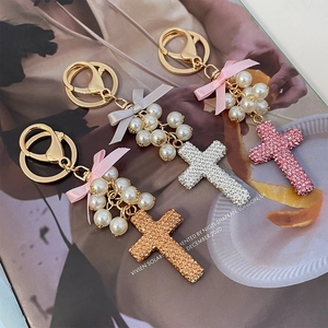 Bowknot pearl cross keychain with sparkling rhinestones for handbags and car keys