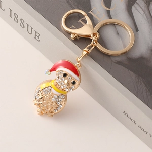 Sparkling Christmas penguin keychain with rhinestones and gold lobster clasp