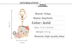 Detail showing dimensions of the crystal-studded cat keychain with 11.2cm x 5.8cm label