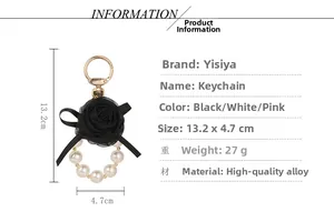 Detail showing dimensions of black rose keychain with faux pearls and alloy hardware