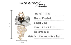 Detailed size specifications of pearl grape keychain with mesh bow, 13.1x3.5cm dimension