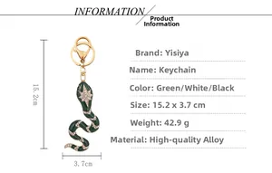 Detail of green enamel snake keychain with rhinestones showing 15.2 x 3.7 cm dimensions