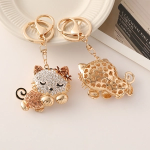 Sparkling rhinestone cat keychains with hollow heart back and gold-plated lobster clasp