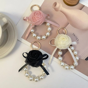 Elegant rose floral pearl keychain charm with ribbon bow for bags and cars in three colors