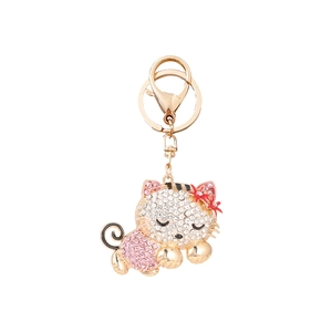 Pink rhinestone kitty cat keychain with gold alloy finish and flower accent