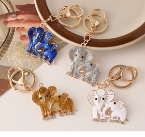 Detailed view of colorful enamel elephant keychains with sparkling crystal accents
