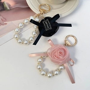 Elegant pearl car keychain with silk rose and handmade tag in black and pink colors