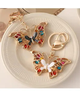 Detailed macro view of colorful crystal butterfly keychain with gold-plated alloy