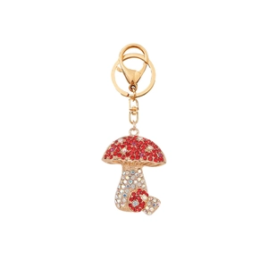 Creative mushroom keychain with red and white rhinestones on golden alloy frame