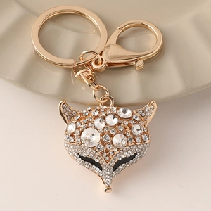 Portachiavi testa di volpe scintillante con strass su anello dorato per borse